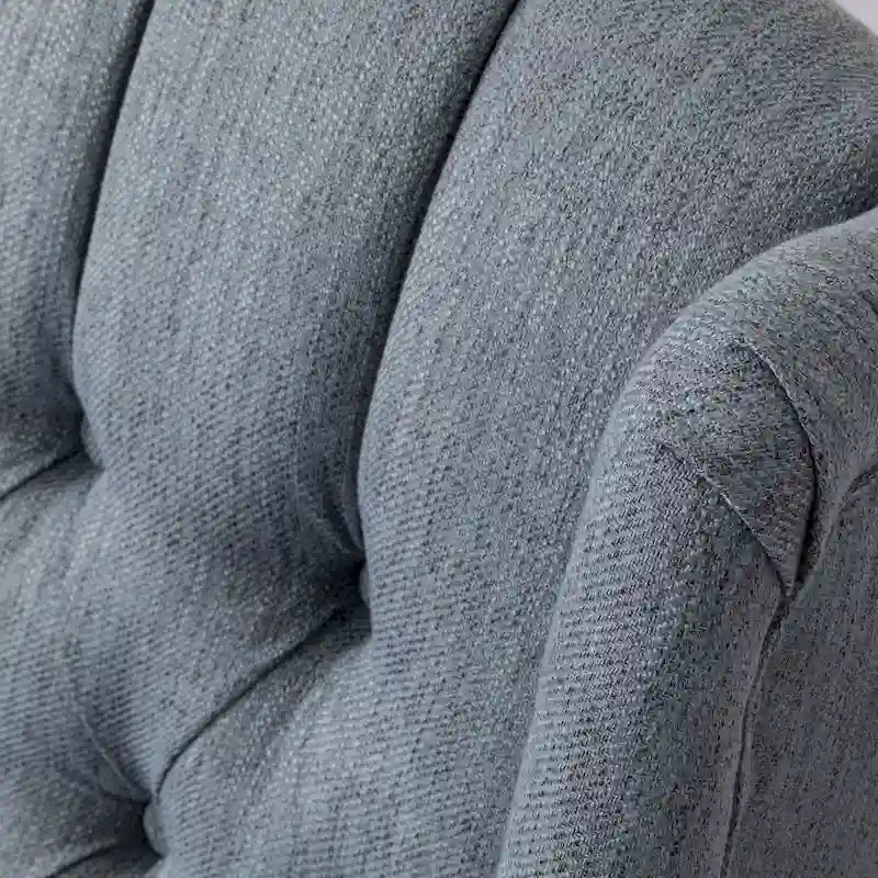 Fauteuil inclinable pivotant contemporain à dossier haut capitonné