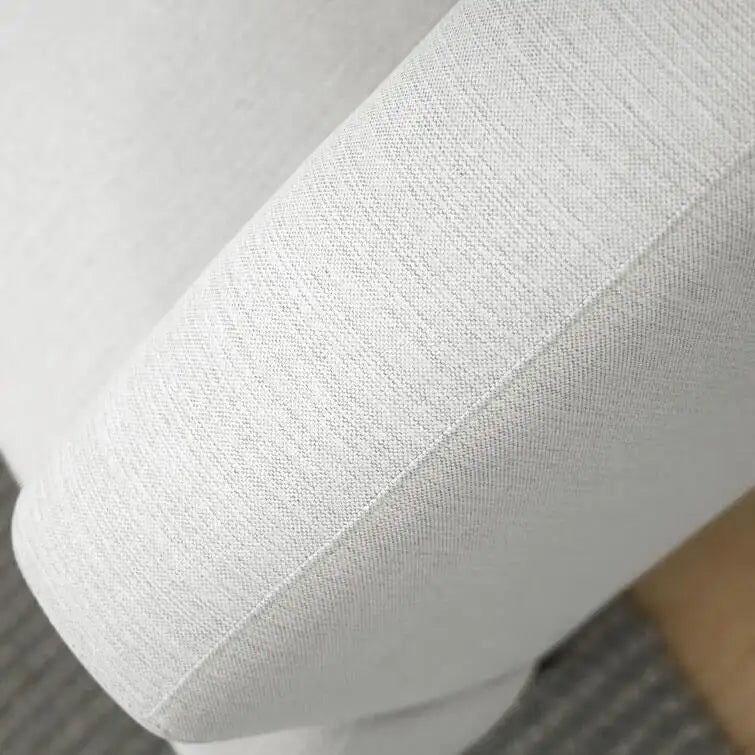 Divano dritto in tessuto beige con braccioli squadrati