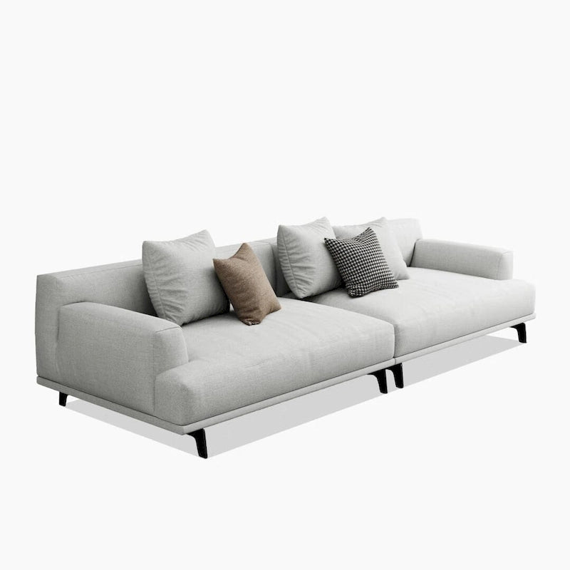 Divano dritto in tessuto beige con braccioli squadrati